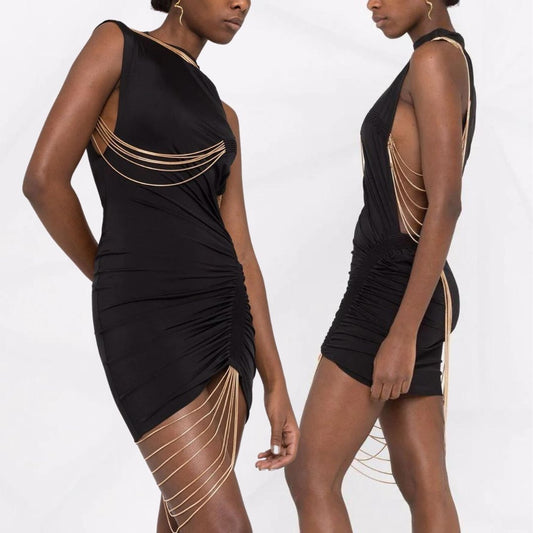 Sexy black bodycon mini dress with open sides and chain detailing.